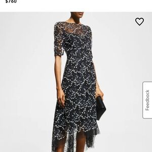 Designer cocktail dress. Size 8 worn once. Absolutely most flattering dress